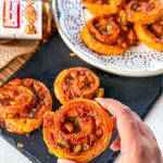 close up shot of the golden crispy schezwan paneer pinwheels1